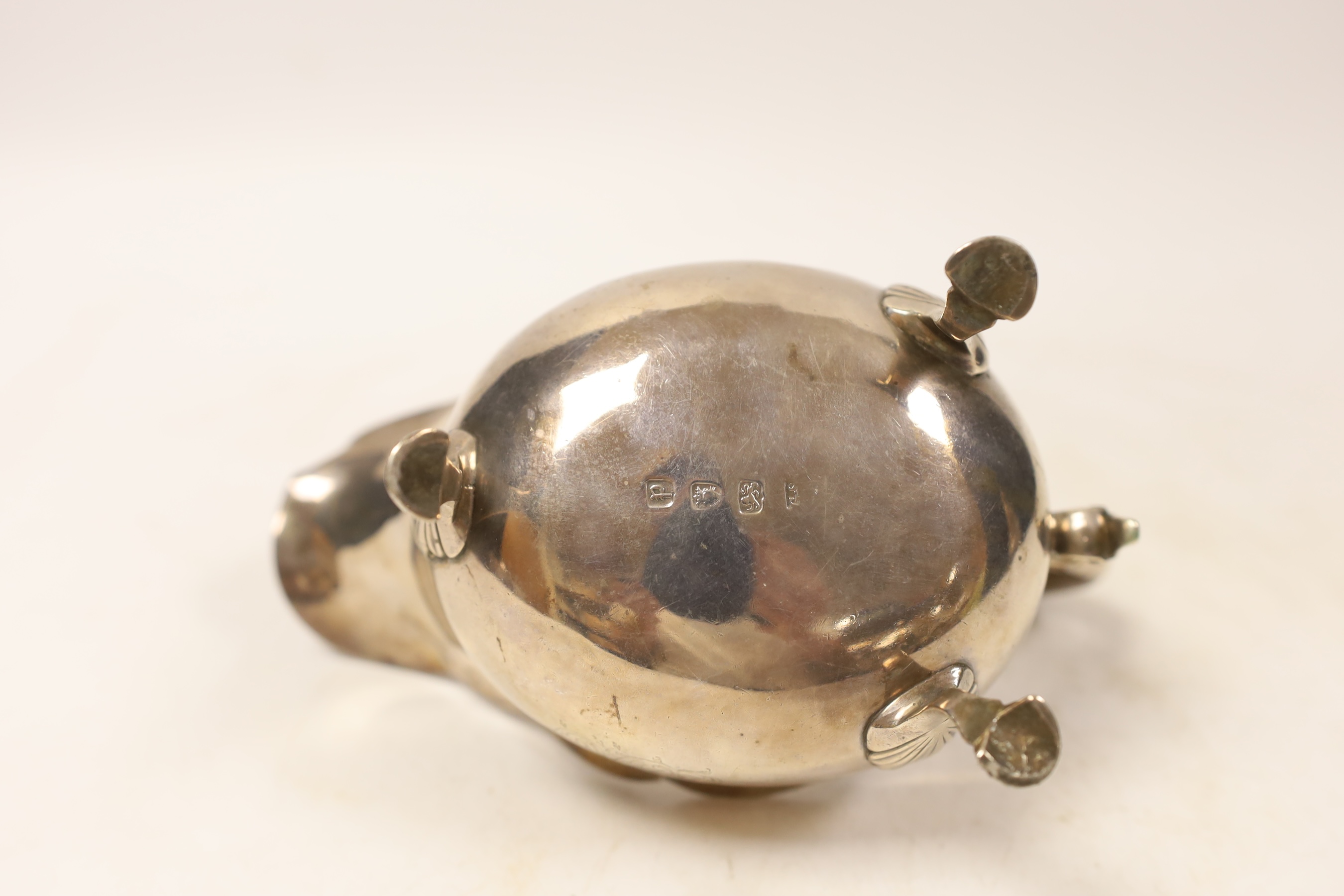 A George III silver sauce boat, with flying scroll handle, George Smith III, London, 1770, length 17.5cm, 9.9oz.